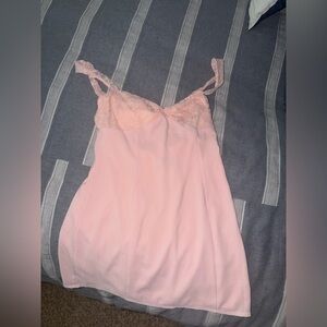 White fox pink mini dress with lace detailing.